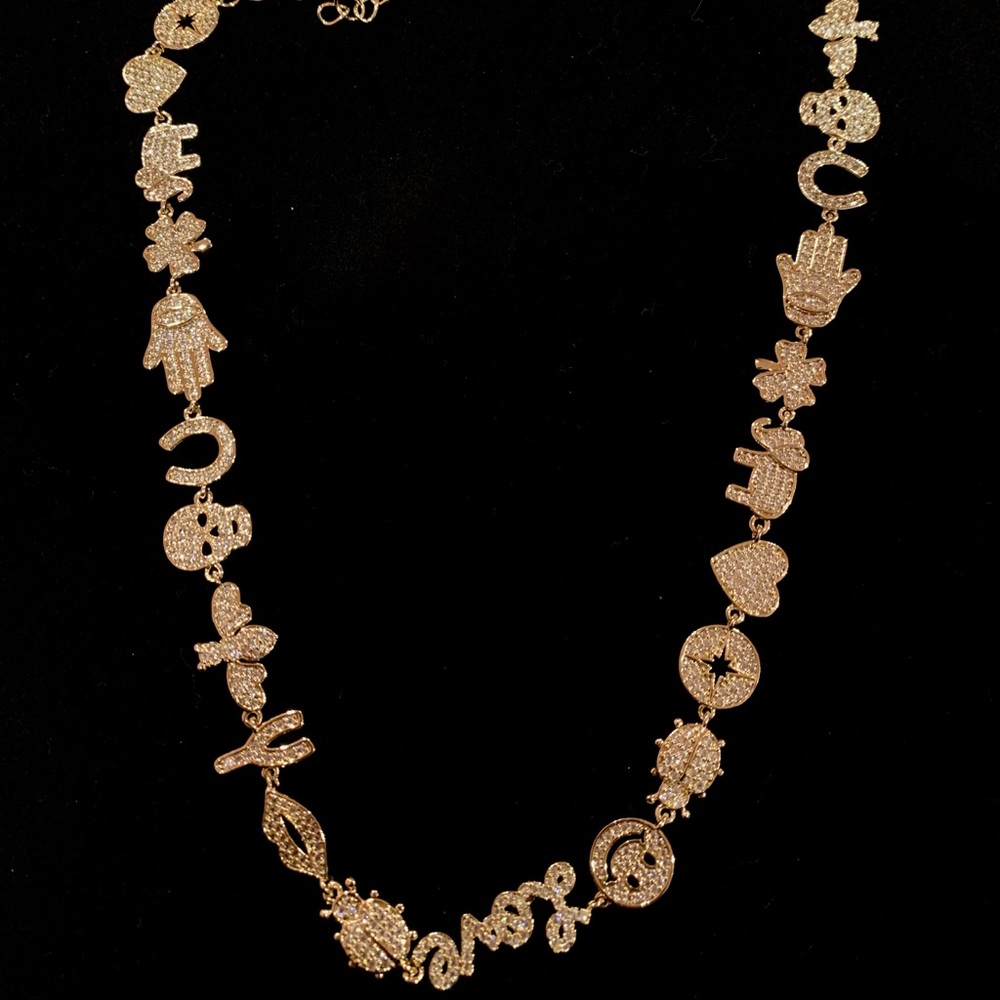 Gold necklace with charms